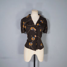 Load image into Gallery viewer, 70s BROWN ART DECO LADY AMULET PRINT PUFF SLEEVE SHIRT - L
