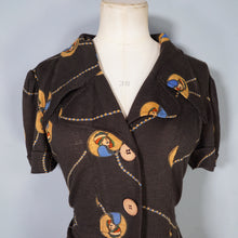Load image into Gallery viewer, 70s BROWN ART DECO LADY AMULET PRINT PUFF SLEEVE SHIRT - L