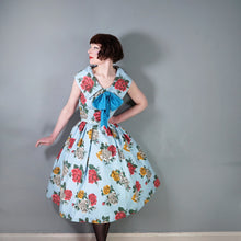 Load image into Gallery viewer, 50s CHAPON LIGHT BLUE HUGE RED WHITE AND YELLOW ROSE PRINT DRESS - M