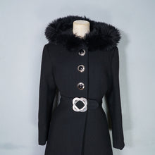 Load image into Gallery viewer, 60s BLACK WOOL COAT BY SIDWALL WITH CELTIC BUCKLE AND SHEEPSKIN HOOD - M