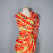Load image into Gallery viewer, 50s FIREY RED ORANGE AND CHARTREUSE ONE SHOULDER HAWAIIAN DRESS WITH SHOULDER CAPE - S
