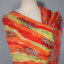 Load image into Gallery viewer, 50s FIREY RED ORANGE AND CHARTREUSE ONE SHOULDER HAWAIIAN DRESS WITH SHOULDER CAPE - S