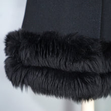 Load image into Gallery viewer, 60s BLACK WOOL COAT BY SIDWALL WITH CELTIC BUCKLE AND SHEEPSKIN HOOD - M