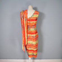 Load image into Gallery viewer, 50s FIREY RED ORANGE AND CHARTREUSE ONE SHOULDER HAWAIIAN DRESS WITH SHOULDER CAPE - S