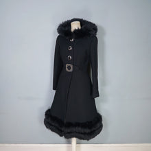 Load image into Gallery viewer, 60s BLACK WOOL COAT BY SIDWALL WITH CELTIC BUCKLE AND SHEEPSKIN HOOD - M