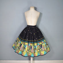 Load image into Gallery viewer, 50s 60s NOVELTY BLACK AND GREEN PEOPLE ART BORDER PRINT FULL SKIRT - 25"