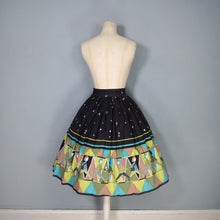 Load image into Gallery viewer, 50s 60s NOVELTY BLACK AND GREEN PEOPLE ART BORDER PRINT FULL SKIRT - 25"