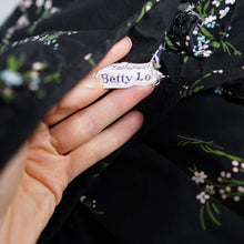 Load image into Gallery viewer, 50s BETTY LO BLACK FLORAL DRESS WITH FULL SKIRT AND SHELF BUST - M