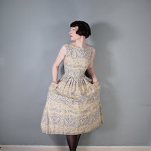 Load image into Gallery viewer, 50s SAMBO FASHIONS LIGHT BROWN BORDER PRINT FULL SKIRTED SUN DRESS - XS-S