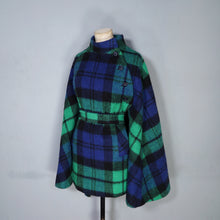 Load image into Gallery viewer, 70s JIMMY HOURIHAN BLACK BLUE AND GREEN PLAID WOOL CAPE WITH BELT - S-M