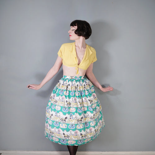 50s GREEN NOVELTY FULL COTTON SKIRT WITH HORSE DRAWN CARRIAGE PRINT - 26