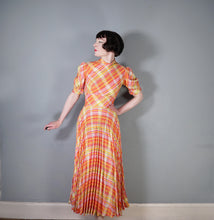 Load image into Gallery viewer, 70s BRIGHT ORANGE AND PINK CHECKED PLEATED MAXI DRESS WITH CUT OUT BACK - S