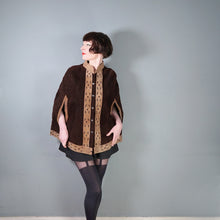 Load image into Gallery viewer, 60s 70s BROWN AND TAN SUEDE FESTIVAL CAPE WITH PUNCHED PATTERNS - S