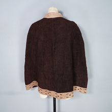 Load image into Gallery viewer, 60s 70s BROWN AND TAN SUEDE FESTIVAL CAPE WITH PUNCHED PATTERNS - S