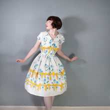 Load image into Gallery viewer, 60s YELLOW BOW AND BLUE ROSE PRINT FULL SKIRTED DRESS - S-M