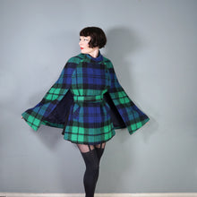 Load image into Gallery viewer, 70s JIMMY HOURIHAN BLACK BLUE AND GREEN PLAID WOOL CAPE WITH BELT - S-M