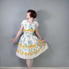 Load image into Gallery viewer, 60s YELLOW BOW AND BLUE ROSE PRINT FULL SKIRTED DRESS - S-M