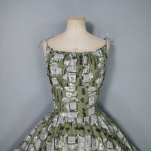 Load image into Gallery viewer, 50s OLIVE GREEN NOVELTY NEWSPAPER AND CARS PRINT STRAPPY SUN DRESS - XS