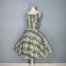 Load image into Gallery viewer, 50s OLIVE GREEN NOVELTY NEWSPAPER AND CARS PRINT STRAPPY SUN DRESS - XS