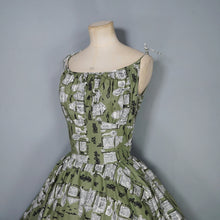 Load image into Gallery viewer, 50s OLIVE GREEN NOVELTY NEWSPAPER AND CARS PRINT STRAPPY SUN DRESS - XS