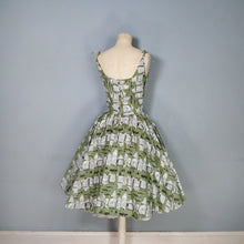 Load image into Gallery viewer, 50s OLIVE GREEN NOVELTY NEWSPAPER AND CARS PRINT STRAPPY SUN DRESS - XS