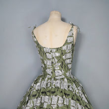 Load image into Gallery viewer, 50s OLIVE GREEN NOVELTY NEWSPAPER AND CARS PRINT STRAPPY SUN DRESS - XS