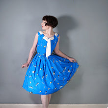 Load image into Gallery viewer, 50s BLUE WHIMSICAL NOVELTY PRINT DRESS WITH FULL SKIRT AND SHAWL NECK - S