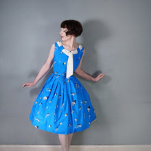 Load image into Gallery viewer, 50s BLUE WHIMSICAL NOVELTY PRINT DRESS WITH FULL SKIRT AND SHAWL NECK - S