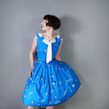 Load image into Gallery viewer, 50s BLUE WHIMSICAL NOVELTY PRINT DRESS WITH FULL SKIRT AND SHAWL NECK - S