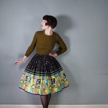 Load image into Gallery viewer, 50s 60s NOVELTY BLACK AND GREEN PEOPLE ART BORDER PRINT FULL SKIRT - 25"