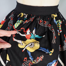 Load image into Gallery viewer, 50s BLACK BIG JIVE DANCERS BORDER PRINT NOVELTY FULL SKIRT - 25&quot;