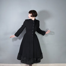 Load image into Gallery viewer, 50s BLACK WOOL FULL SKIRTED PRINCESS COAT WITH FAUX FUR HEM - S-M