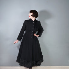 Load image into Gallery viewer, 50s BLACK WOOL FULL SKIRTED PRINCESS COAT WITH FAUX FUR HEM - S-M