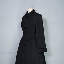 Load image into Gallery viewer, 50s BLACK WOOL FULL SKIRTED PRINCESS COAT WITH FAUX FUR HEM - S-M