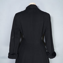 Load image into Gallery viewer, 50s BLACK WOOL FULL SKIRTED PRINCESS COAT WITH FAUX FUR HEM - S-M