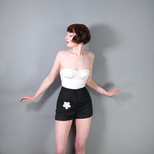 Load image into Gallery viewer, 60s / 70s HIGH WAISTED BLACK MINI SHORTS WITH FLORAL PATCH POCKET - 26"