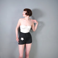 Load image into Gallery viewer, 60s / 70s HIGH WAISTED BLACK MINI SHORTS WITH FLORAL PATCH POCKET - 26"