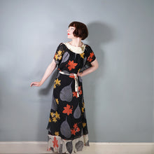 Load image into Gallery viewer, 70s ARISTOS BLACK AND CREAM AUTUMNAL LEAF PRINT CHIFFON MAXI DRESS - XS