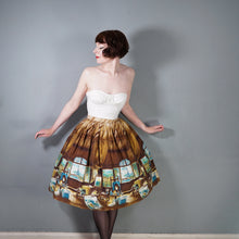Load image into Gallery viewer, 50s BROWN AND TURQUOISE PARIS ARTISTS STUDIO NOVELTY PRINT SKIRT - 26"