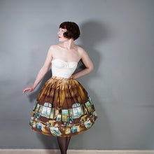 Load image into Gallery viewer, 50s BROWN AND TURQUOISE PARIS ARTISTS STUDIO NOVELTY PRINT SKIRT - 26"