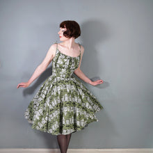 Load image into Gallery viewer, 50s OLIVE GREEN NOVELTY NEWSPAPER AND CARS PRINT STRAPPY SUN DRESS - XS