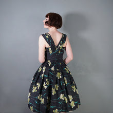 Load image into Gallery viewer, 50s "FEMINELLA" BLACK YELLOW FLORAL EASTER LILY PRINT FULL SKIRTED DRESS - S