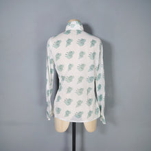 Load image into Gallery viewer, 70s GREEN AND WHITE SEMI SHEER ART DECO LADY FACE PRINT NOVELTY SHIRT - S