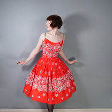 Load image into Gallery viewer, 60s "ALU LOLE" BRIGHT RED WHITE AND GOLD FLORAL HAWAIIAN FULL SKIRTED SUN DRESS - S