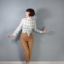 Load image into Gallery viewer, 70s GREEN AND WHITE SEMI SHEER ART DECO LADY FACE PRINT NOVELTY SHIRT - S