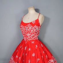 Load image into Gallery viewer, 60s "ALU LOLE" BRIGHT RED WHITE AND GOLD FLORAL HAWAIIAN FULL SKIRTED SUN DRESS - S