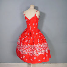 Load image into Gallery viewer, 60s "ALU LOLE" BRIGHT RED WHITE AND GOLD FLORAL HAWAIIAN FULL SKIRTED SUN DRESS - S