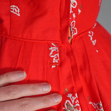 Load image into Gallery viewer, 60s "ALU LOLE" BRIGHT RED WHITE AND GOLD FLORAL HAWAIIAN FULL SKIRTED SUN DRESS - S