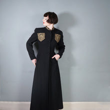 Load image into Gallery viewer, 30s 40s LONG BLACK WOOL COAT WITH GOLD MILITARY STYLE POCKETS AND COLLAR - S-M