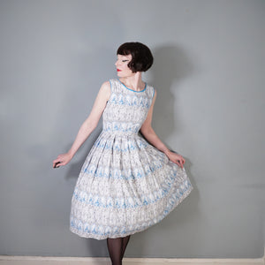 50s PALE BLUE NOVELTY DRESS IN ROMANTIC LADY AND COURTIER PRINT - XS-S